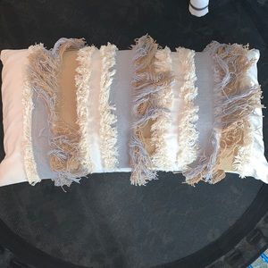 Cream pillow with blue and tan stripes